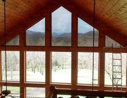 Removable Solar Inserts put in the top windows, plus matching motorized solar shades going in the lower windows! Best Solar Control removable solar inserts and solar shades